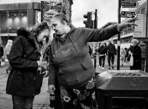 Street photograph of two women.