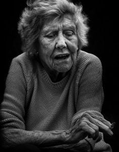 Street photography of an elderly woman - black and white.