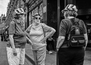 A woman wearing a hat at Leeds Pride 2019.