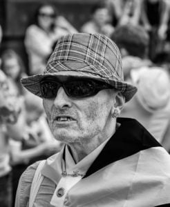 A man wearing sunglasses at Leeds Pride 2019.