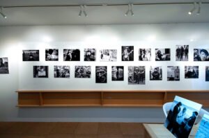 A room filled with black and white photographs reminiscent of Goodbye Yorkshire.