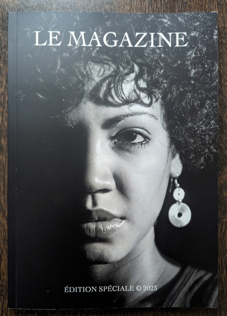 The cover of le magazine with an image of an afro-haired woman showcases a captivating auto draft.